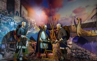 Muzei Stanovlennia Ukrainskoi Natsii in Kyiv - dramatic diorama of medieval warriors in chainmail planning a campaign near a wooden Viking ship