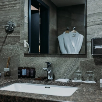 Favor Park Hotel - modern and clean bathroom interior with a big mirror