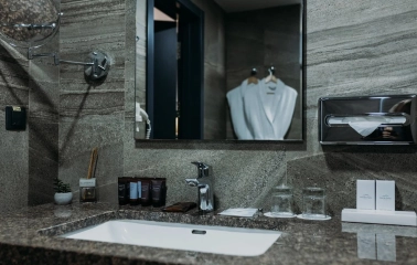 Favor Park Hotel - modern and clean bathroom interior with a big mirror