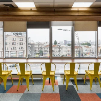 Recreation area with yellow chairs at Peremoga Space in Kyiv
