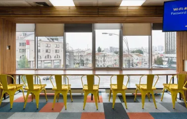 Recreation area with yellow chairs at Peremoga Space in Kyiv