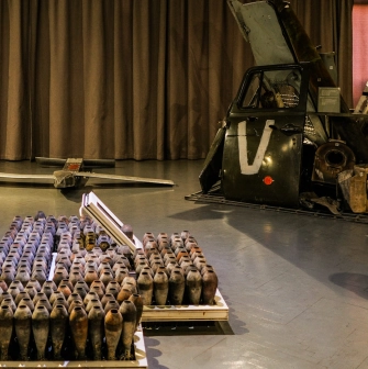War Museum in Kyiv - damaged military equipment and artillery shells displayed inside the exhibition hall