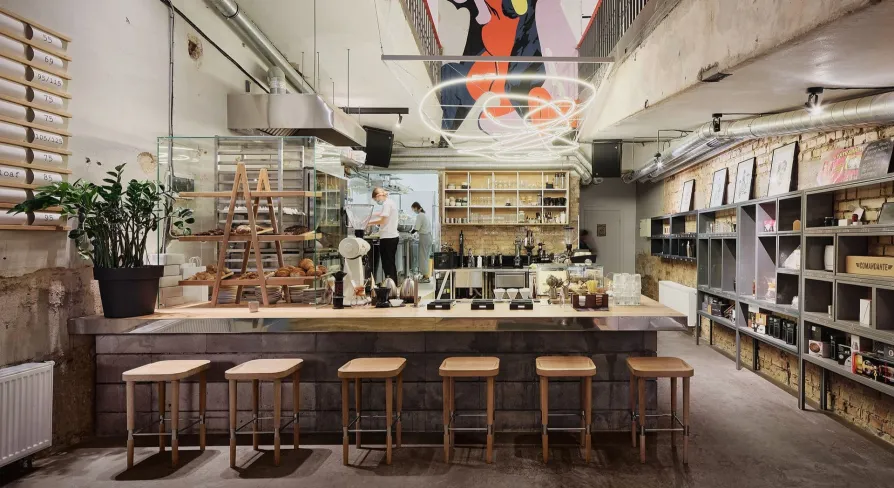 Octo Tower - modern interior of a cafe with a working kitchen