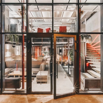 Facade of Fatum bar in Kyiv with a glass entrance and modern design