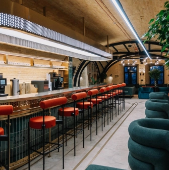 Creative States - long bar counter with high chairs in a lounge area