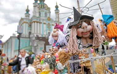 Handmade souvenir dolls with a view of St. Andrew's Church in Kyiv